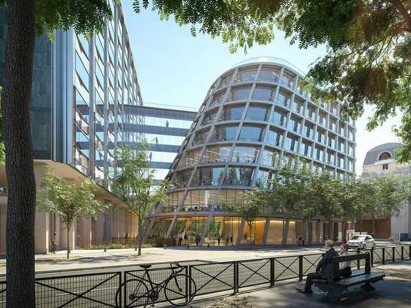 vue du projet depuis l'Avenue Emile Zola et plus particulierement l'extension consituté d'un exosquellette en béton brut extérieur.